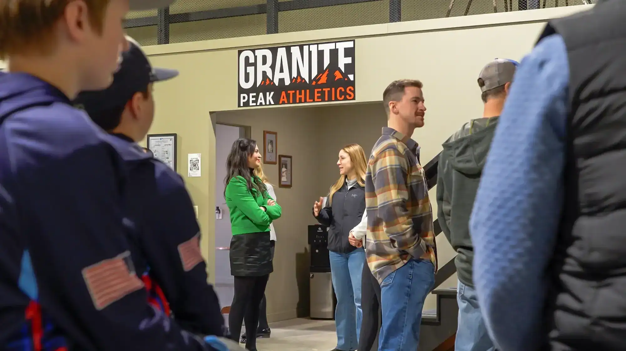 Secretary of State Christi Jacobsen visits with the team at Granite Peak Athletics in East Helena.