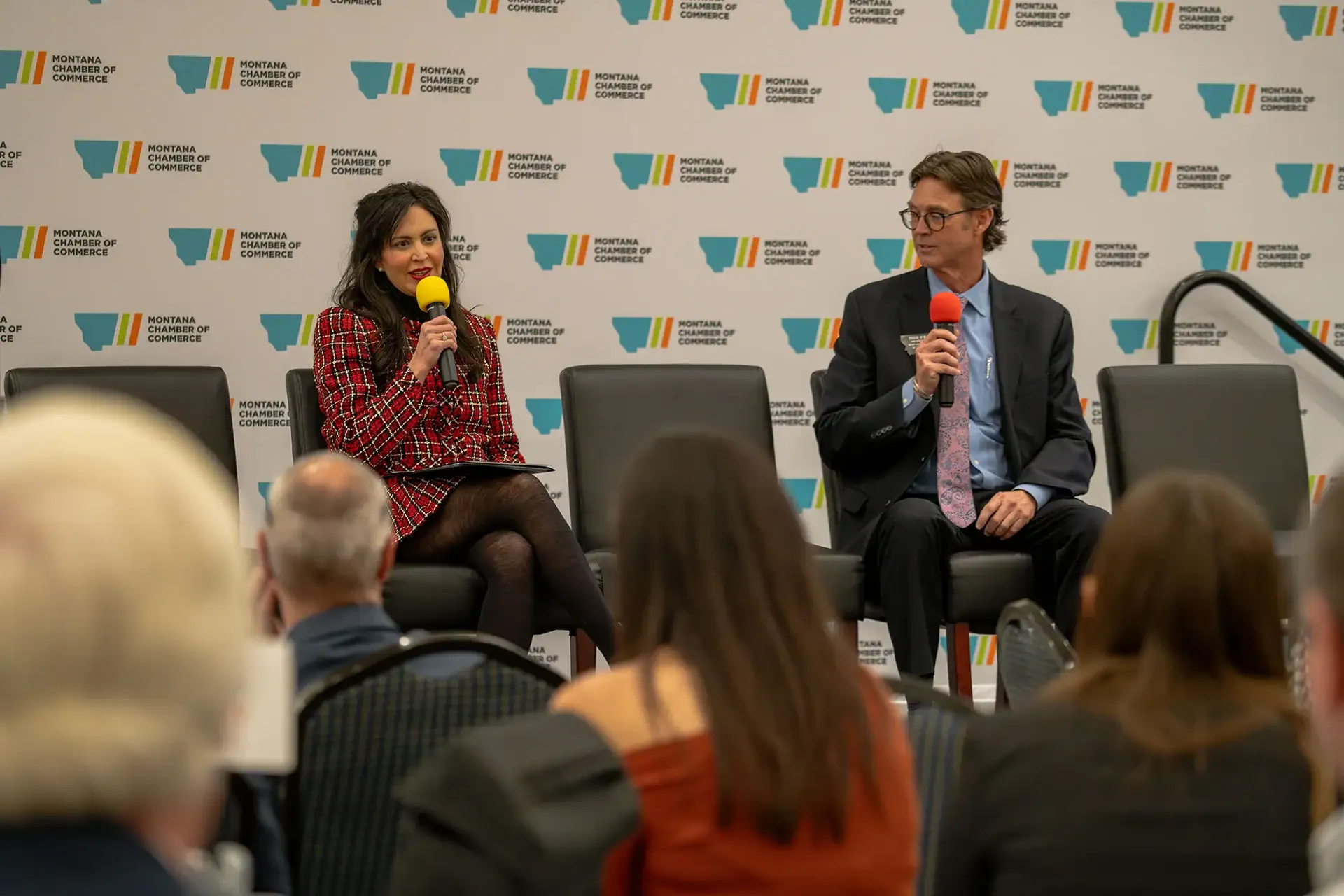 Montana Secretary of State Christi Jacobsen visits with Todd O'Hair of the Montana Chamber of Commerce.