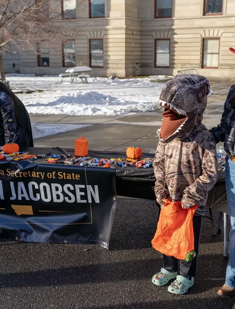Montana Secretary of State Christi Jacobsen visits with trick-or-treaters at the Montana State Capitol.