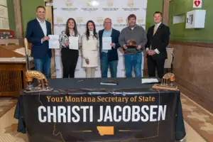 Montana Secretary of State Christi Jacobsen with leaders from the Montana Mining Association.