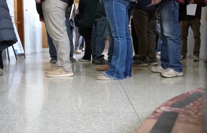 Secretary Christi Jacobsen: ‘First check with verification tool flags multiple voter records as potential non-citizens’ 1 Lines form outside an election office on an Election Day in Montana.