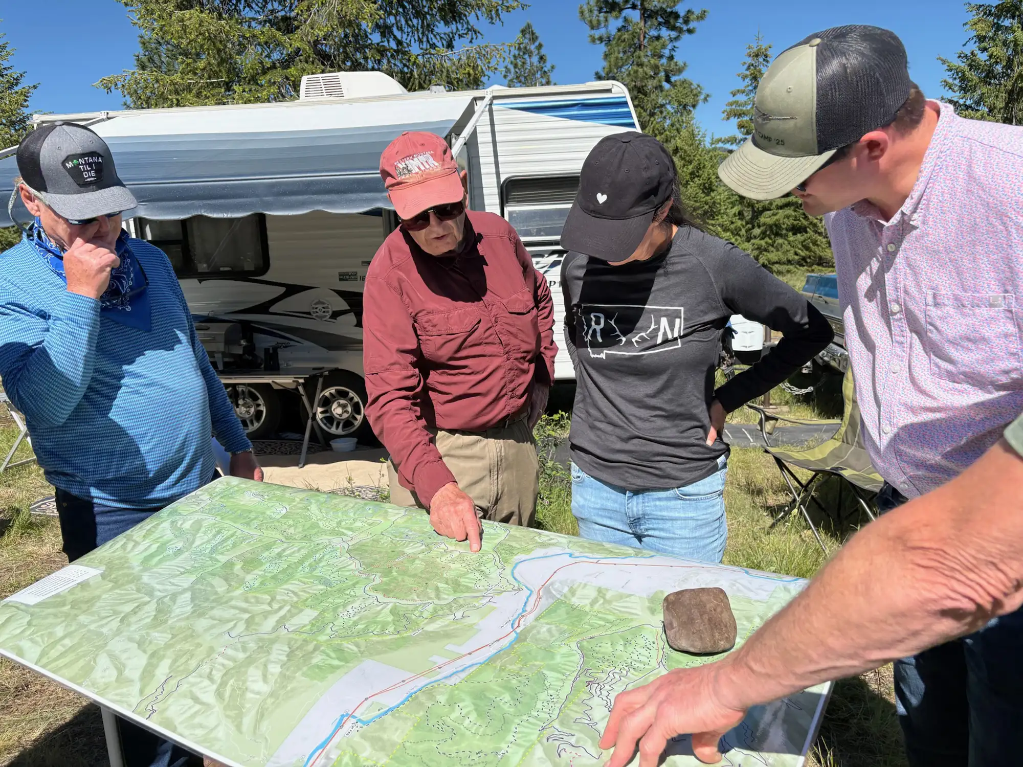 Montana Secretary of State Christi Jacobsen looks over terrain maps during a recent Montana trip.