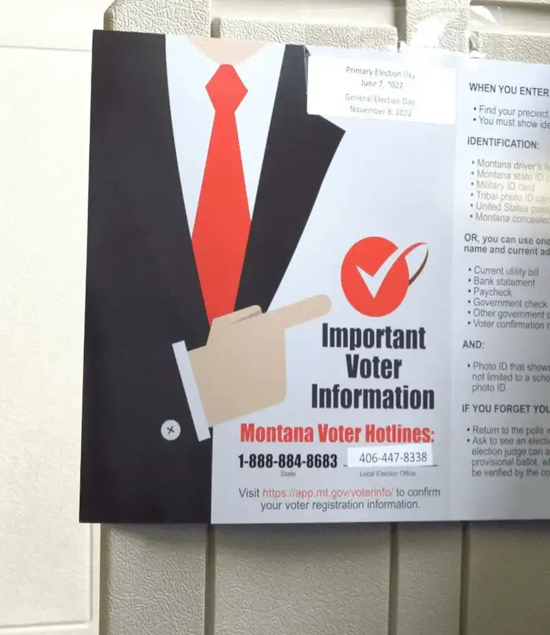 'Great quality control check': Secretary of State's Office provides updates on postelection audit, future election management system 1 A voter information flyer highlighting the Secretary of States Office with a red tie graphic and a checkmark is attached to a beige voting booth. In the background, its reflection appears on another booth. The flyer mentions Montana voter information hotlines.