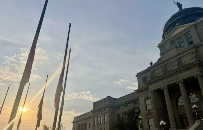 More than 5,200 new businesses registered in Montana in August 2024 6 The sun sets behind Montana’s government building with a dome, as several flags fly at half-staff in the warm evening light of August 2024. The sky is partly cloudy, hinting at opportunities for new businesses on the horizon.