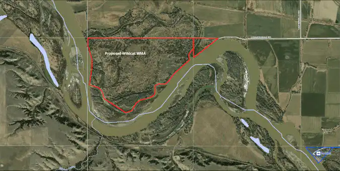 A satellite image shows fields and a winding river with an area labeled Proposed Wildcat WMA outlined in red near the river in southeast Montanas mostly rural landscape. Roads, terrain variations, and potential public access points are visible.