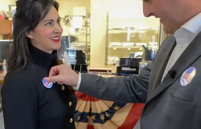 'Get #VoteReady': Secretary Christi Jacobsen, Montana Election Team encourage eligible Montanans to participate in National Voter Registration Day 1 Montana Secretary of State Christi Jacobsen receives her "I Voted" sticker after casting her votes in a Montana election.